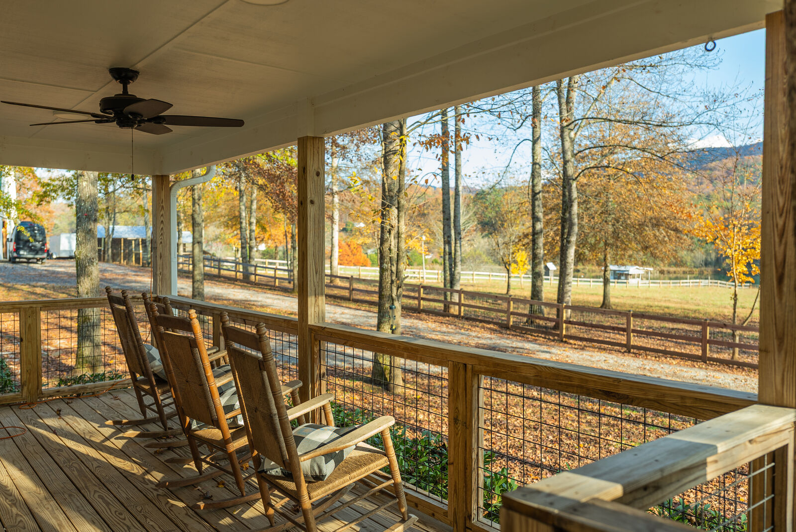 Covered back deck with rocking chairs