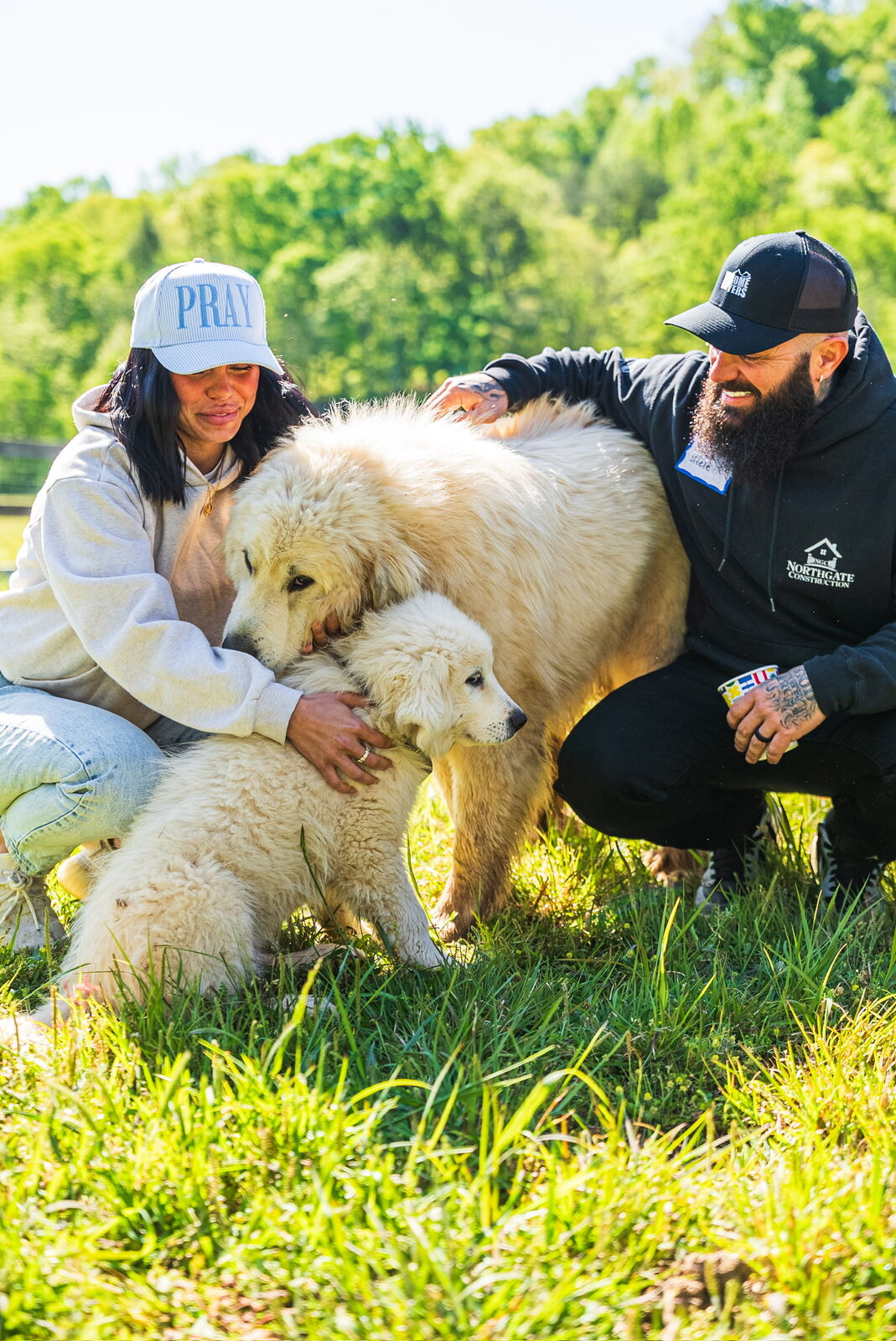 Guests petting the farm dogs
