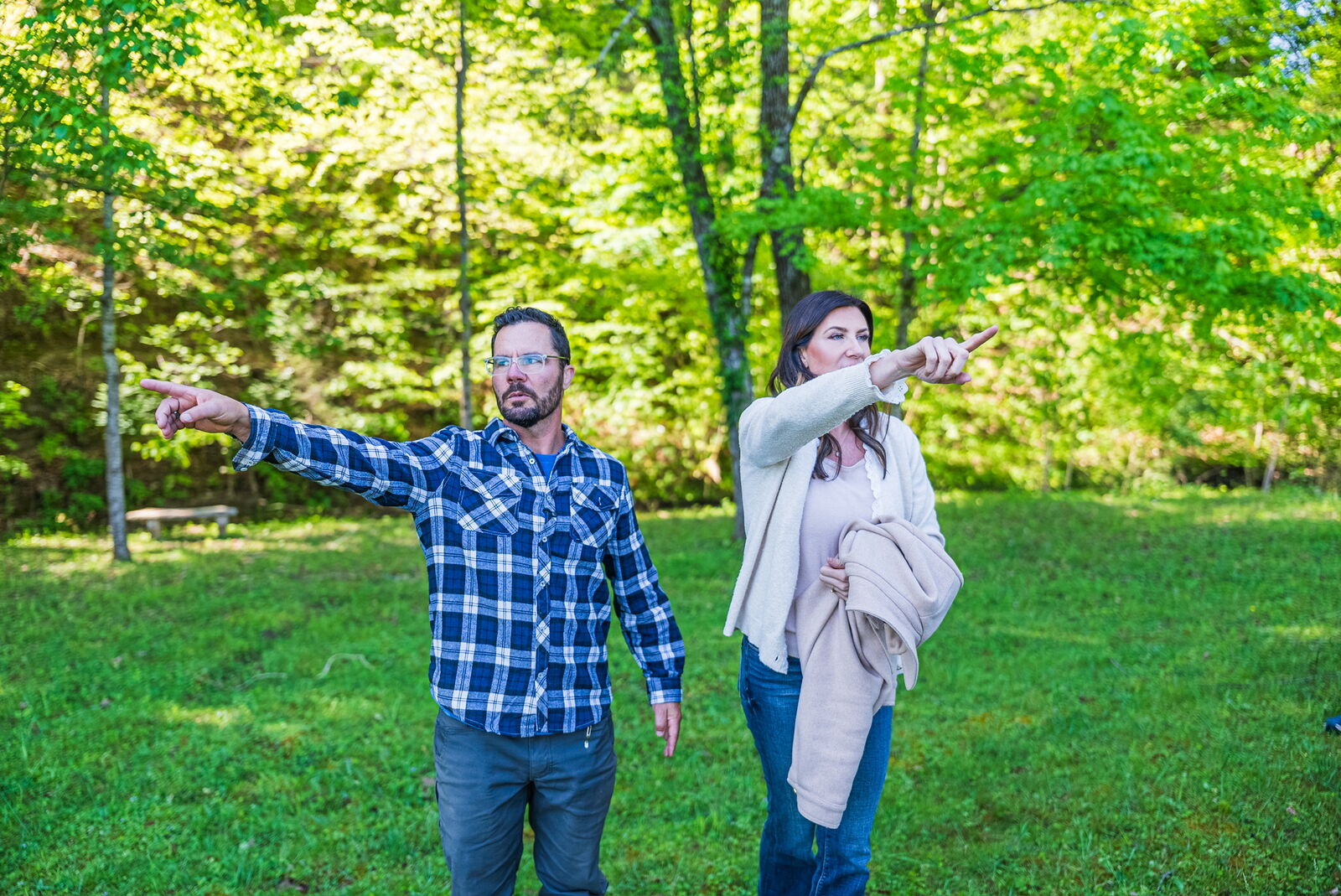 Hosts pointing out features of the property